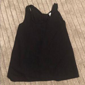 Black dressy sleeveless shirt with large bow